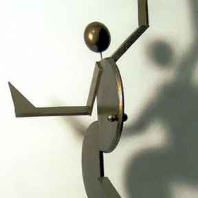 photo of female dancer wood sculpture